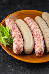 raw sausages pork, beef, chicken, fresh tasty food dish gourmet food background on the table rustic food top view copy space