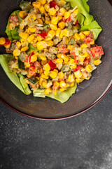 Corn salad vegetables fresh tasty food dish gourmet food background on the table rustic food top view copy space keto and paleo diet Vegetarian and vegan food