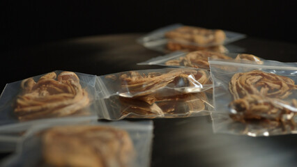Magic mushrooms controlled substances, illegal for sale. Shrooms packed in the plastic bag for possession transportation. Drugs trafficking. Taking psilocybin magic mushrooms make you hallucinate.