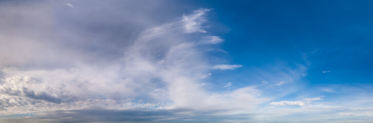 Fototapeta premium Majestic Cloudscape Over Clear Blue Sky in British Columbia, Canada