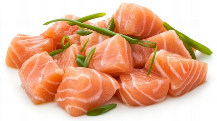 Fresh salmon cubes, garnished with green onions.  Ready for cooking!