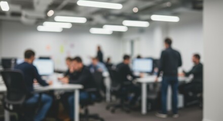 A bustling modern workspace with indistinct figures in the background, ideal for business and technology themes.