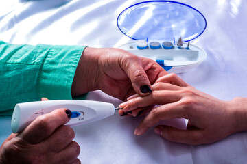 Hand massage. A physical therapist presses specific spots