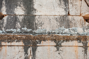 Ancient wall background with old concrete bricks