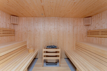 Discover a Serene Wooden Sauna Interior that Promotes Relaxation and Enhances Wellness