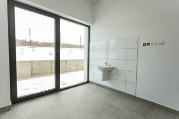 This is a Modern Minimalist Interior that features a stunning Snowy View outside