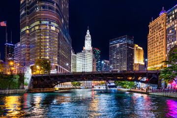 View of Chicago, Illinois skyline and the Wabash Avenue bridge, by night. Chicago is the most...