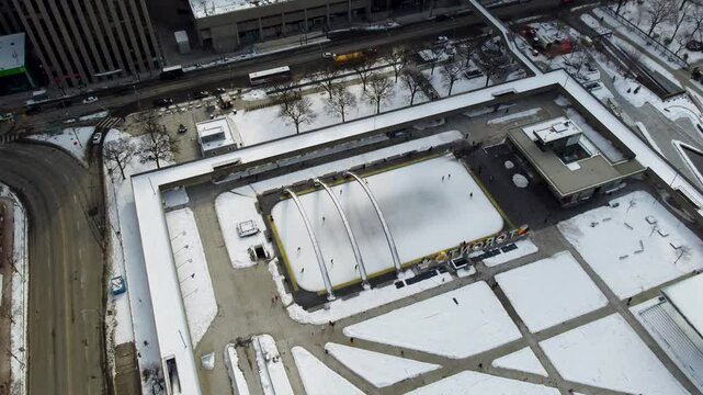 Aerial winter view of the ice skating rink at Nathan Phillips Square 4K