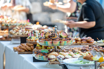 catering wedding buffet with variety of food snacks and appetizers