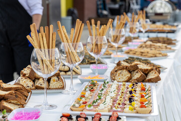 catering wedding buffet with variety of food snacks and appetizers