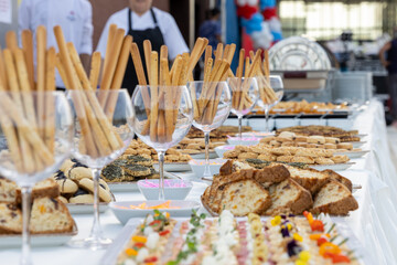 catering wedding buffet with variety of food snacks and appetizers