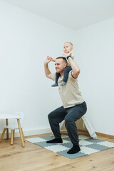 Enjoy a Playful Workout A Father Doing Squats with His Child for Fun and Fitness Together