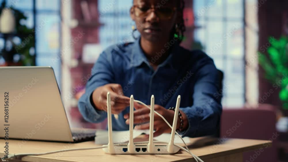 Poster african american woman restarting her wireless router and checking network settings to resolve an in