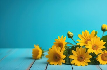 Beautiful bouquet of yellow daisies lie on a blue wooden area. Blue background. Space for text. Banner