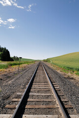 Fototapeta premium Vertical view of Railroad tracks used for the transport of farm goods in the Palouse region of Washington State