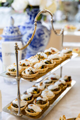 catering buffet with different food snacks and appetizers on table
