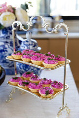 catering buffet with different food snacks and appetizers on table