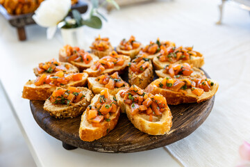 catering buffet with different food snacks and appetizers on table