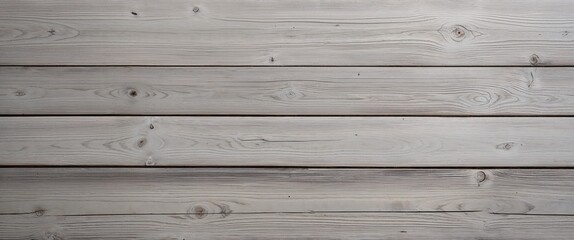 a wooden surface, showcasing a vertical layout of four wide planks. The wood has a weathered and rustic appearance, with a predominantly light gray color, interspersed with subtle variations in tone. 