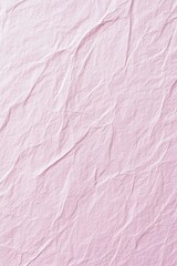 Close-up of crumpled, pink, textured fabric.