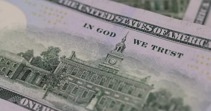 inscriptions on one hundred American dollars of a new sample, details of the banknote of genuine American dollars with a face value of one hundred , reverse side