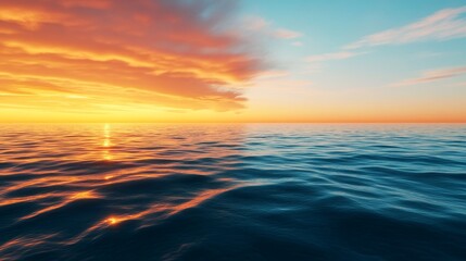Obraz premium The ocean is calm and the sky is orange and pink