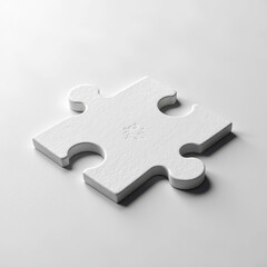 Fototapeta premium Stark Contrast: White Jigsaw Puzzle Piece on a Purely Transparent Background. A white jigsaw puzzle piece on a white surface.