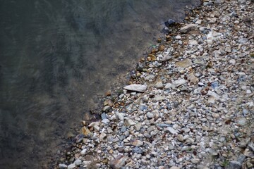 river stones, rocks on the edge of the river