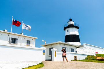 Building view of the Fuguijiao lighthouse at the northernmost proper point(North Coast and Guanyinshan National Scenic Area) in New Taipei City, Taiwan.