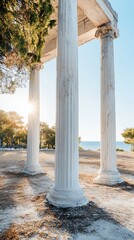 Coastal sunrise view of ancient columns
