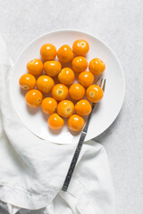Overhead view of golden gooseberries, top view of Peruvian groundcherry