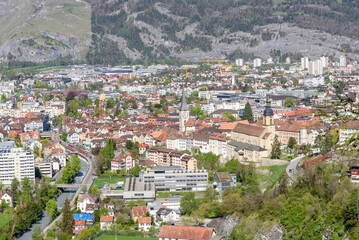 Fototapeta premium View from above of Chur city centre on a sunny spring day. Canton of Grisons, Switzerland.