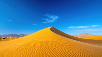 Majestic Desert Dune Under a Vivid Blue Sky