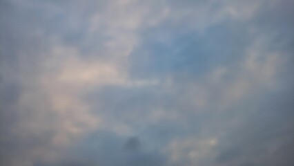 Blue sky with clouds and sun reflection.The sun shines bright in the daytime