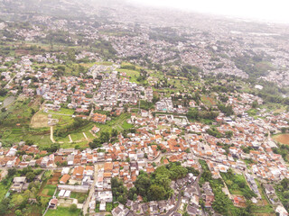 Bandung, Indonesia. Aerial Landscape view of massive civilization and population. High angle view of Residential District and Cityscape. Densely Populated Settlements. Bandung City View, Asia