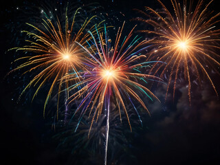 Fototapeta premium Fireworks burst in the sky, creating a mesmerizing and festive atmosphere.