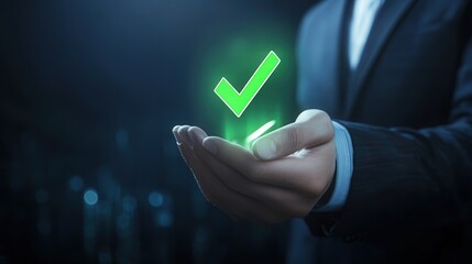 businessman hand holding a glowing green checkmark, representing project validation and success.