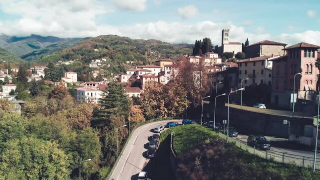 Beautiful aerial view of Barga, nestled in the Garfagnana valley, bathed in sunlight
