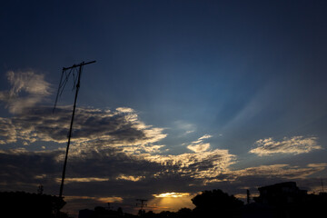 Silhouette of antenna on the background of the sunset sky.