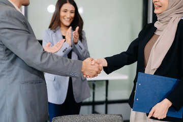 Business partnership handshake concept.Photo  coworkers handshaking process.Successful deal after great meeting.