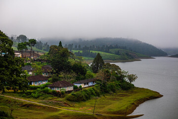 A beautiful landscape of tea plantation with houses. Picture clicked at Magamalai, mountain range...