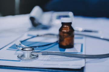 stethoscope on a report stethoscope on a clipboard stethoscope on a book