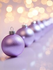 Fototapeta premium A row of purple Christmas ornaments on a light violet background, with reflections and bokeh lights. The festive decorations look elegant against the soft pastel color backdrop