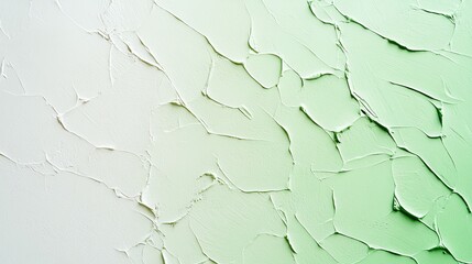 Abstract textured background in shades of green and white, with a pattern resembling cracked paint or dried earth.