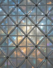 Iridescent Glass Tile Facade with Diamond Lattice and Subtle Refraction