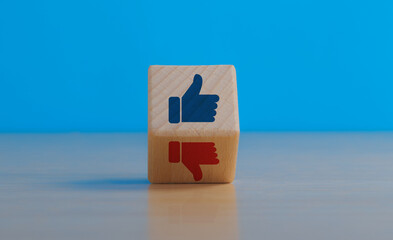 Customer rating concept, toggle like and dislike on wooden block