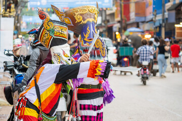 Loei, Thailand - July 6 2024  Phi Ta Khon festival Ghost mask and colorful costume Fun Traditional...