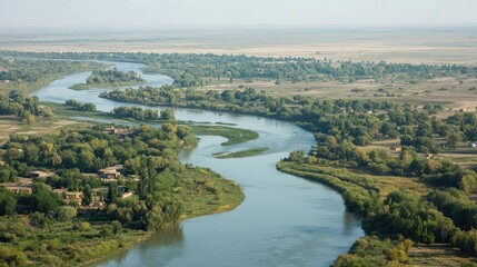 High-angle view of winding river through rural landscape
