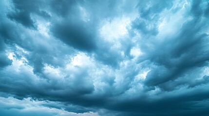 Obraz premium Photograph of a cloudy sky with dark storm clouds. Panoramic view of the cloudy blue sky, a stock photo, photorealistic.
