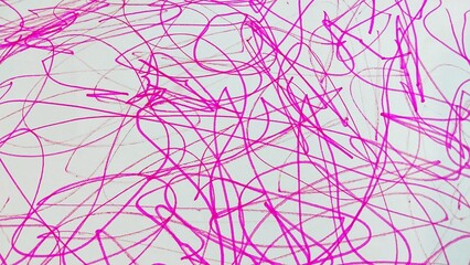 A chaotic collection of pink scribbles and lines on a white background, creating a dynamic, abstract design